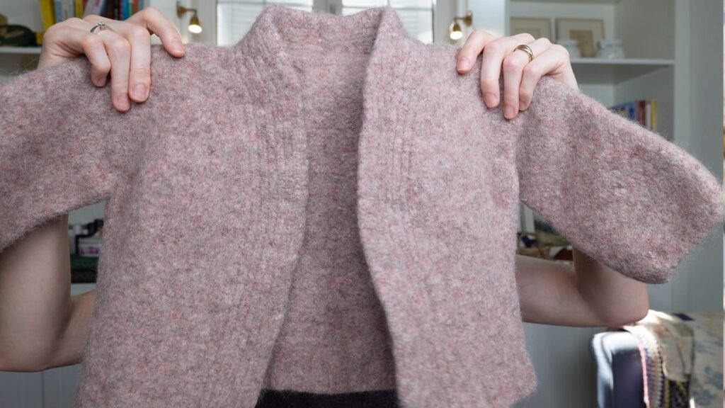 showing my felted timepiece cardigan