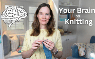 a women wearing a yellow sweater sitting in her living room knitting with blue yarn