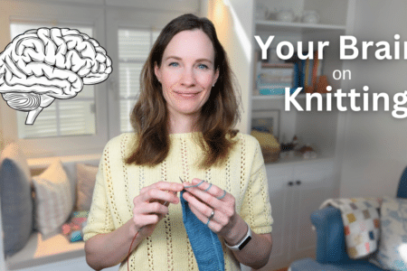 a women wearing a yellow sweater sitting in her living room knitting with blue yarn